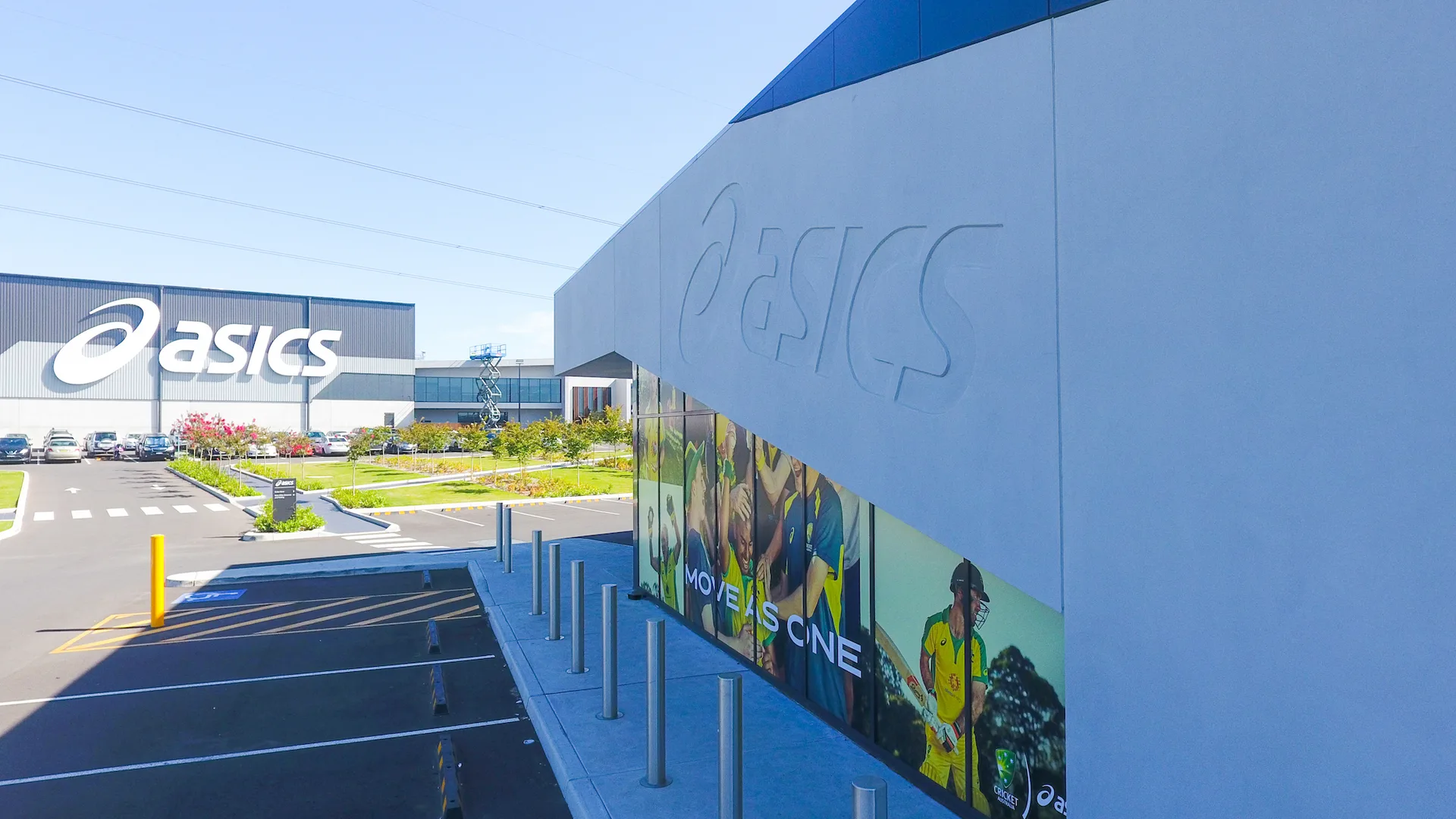 ASICS Marsden Park - rendered facade running the length of the store with the engraved ASICS mark