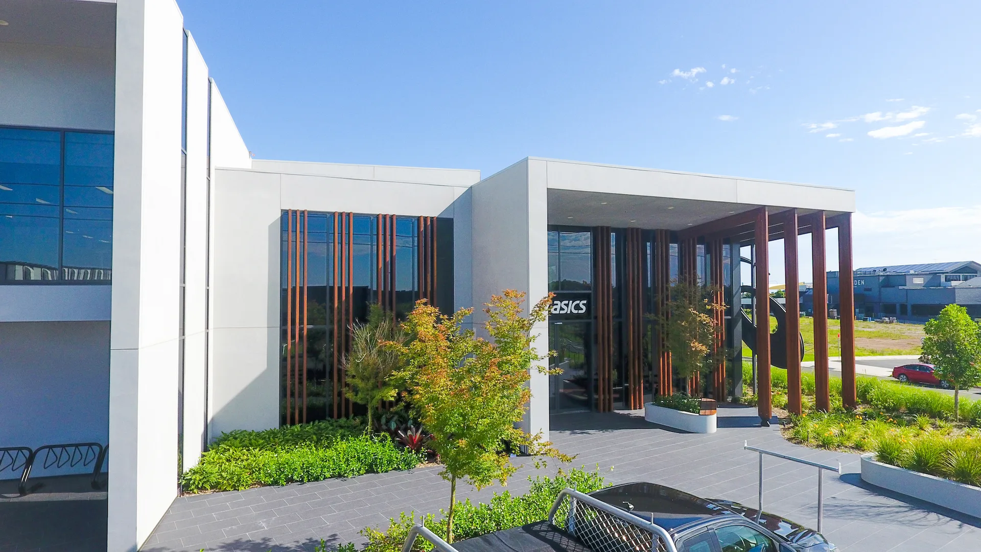 ASICS Marsden Park - office facade and entrance with timber battens
