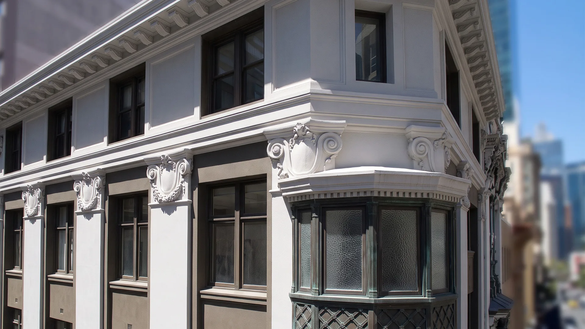 Rolex Building, 192 Pitt Street, Sydney CBD - restored cornice, capitals and copper bay window detail